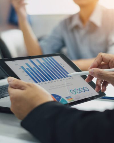 Two businessman consult analyzing company financial cash flow result. Concept for teamwork business corporate meeting and economy fund. Two businessman consult analyzing company financial cash flow result. Concept for teamwork business corporate meeting and economy fund.